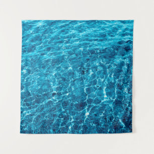 Tapete De Parede Foto de uma macro borbulhando água do mar azul cla