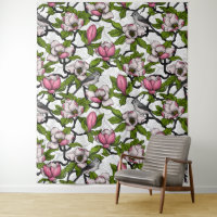 Magnólia florescente e pássaro-do-titrato