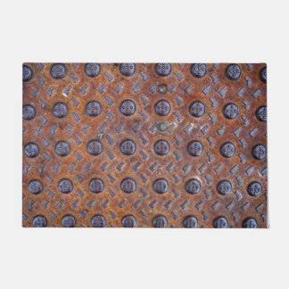 Tapete Grelha envelhecida do metal na esteira de porta