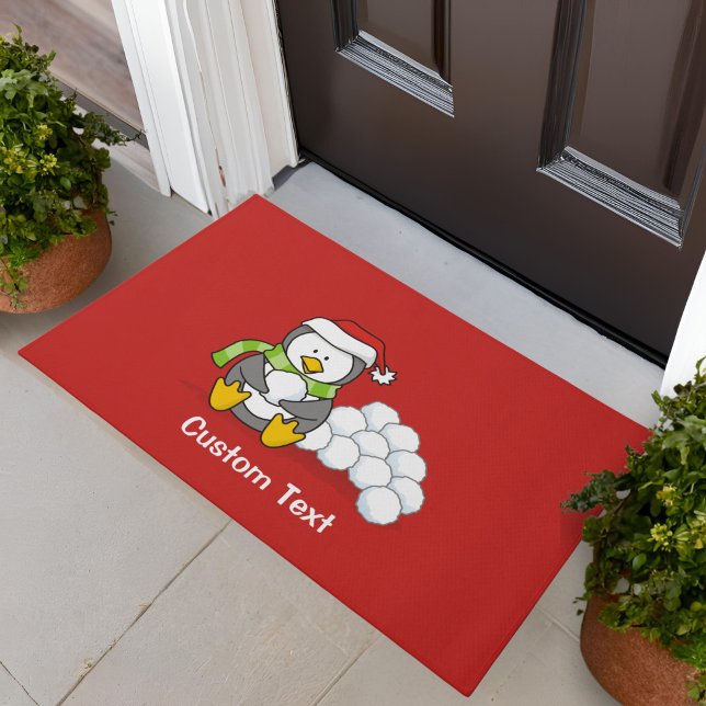 Tapete Pinguim de Natal sentado com bolas de neve (Criador carregado)