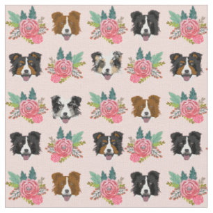 Tecido Border Collie encara flores cor-de-rosa