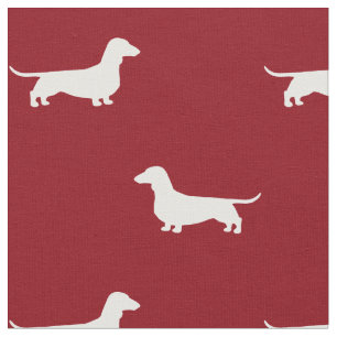 Tecido O cão do Dachshund mostra em silhueta o vermelho 