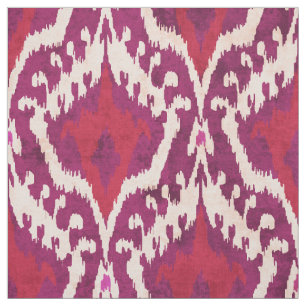 Tecido Padrão tribal vermelho e roxo de ikat