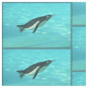 Tecido Pinguim que nada debaixo d'água