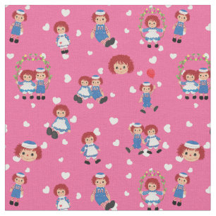 Tecido Raggedy Ann e Andy em Corações Caindo em Rosa