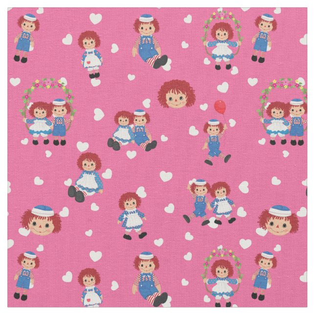 Tecido Raggedy Ann e Andy em Corações Caindo em Rosa (Detalhe)