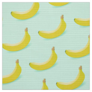 TECIDO TRENDY BANANAS DESIGN PADRÃO NO FUNDO VERDE