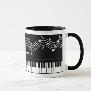 Teclado de piano e caneca das notas