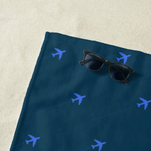toalha azul de praia em aviões para piloto
