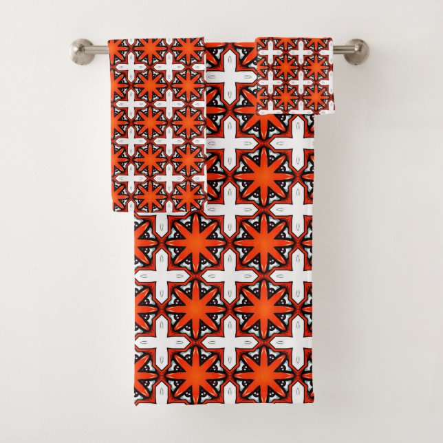 Toalha com padrão geométrico vermelho e laranja (Insitu)