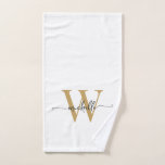Toalha De Mão Nome com Monograma em Ouro Branco com Letra Modern<br><div class="desc">Toalha de mão personalizada feminina moderna e elegante em branco e dourado com monograma inicial do nome em letra manuscrita. Apresenta um primeiro nome (ou sobrenome) em uma linda tipografia de letra manuscrita com cauda swash (ou caligrafia) com monograma inicial em dourado e preto sobre fundo branco. Ótimo presente feminino...</div>