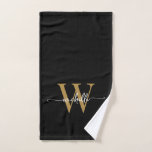 Toalha De Mão Nome Monograma Elegante Preto Dourado Script Moder<br><div class="desc">Toalha de mão personalizada feminina moderna e elegante em preto e dourado com monograma inicial do nome ou assinatura. Apresenta um primeiro nome (ou sobrenome) em uma linda tipografia de letra manuscrita com cauda swash (ou caligrafia) com monograma inicial em dourado e branco sobre preto. Ótimo presente feminino e elegante...</div>
