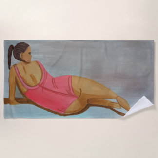 Toalha De Praia A woman is a swimming costume a beach towel