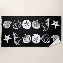 Toalha de praia com desenho de conchas marinhas em