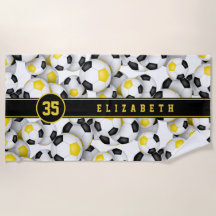 Equipe de ouro negro colore bolas de futebol padrõ