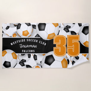 Toalha De Praia Muitas bolas de futebol cor preto alaranjado