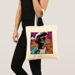 Tote Estampa Hip Hop - Street Graffiti Art - Bolsa<br><div class="desc">T-shirt with a Hip Hop Graffiti print, featuring vibrant and stylized art of a man wearing sunglasses and a cap, inspired by the style of graffiti and reggae culture. The artwork combines retro and urban elements, with balanced saturation and precise strokes in the digital painting style. Created in Adobe Illustrator,...</div>