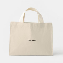 Tote Mini Uma bolsa bege com alças brancas