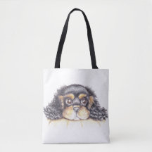 O bolsa das letras grandes com o filhote de
