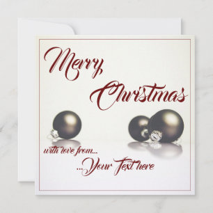 Três bolas de natal em frente ao fundo da luz