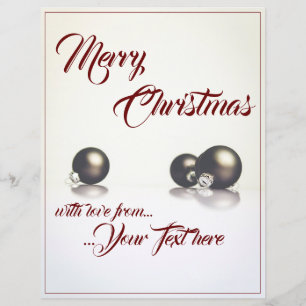 Três bolas de natal em frente ao fundo da luz