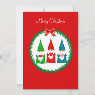 Três gnomos de Natal em vermelho