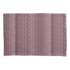 Trilhas do pneu de carro no rosa da praia