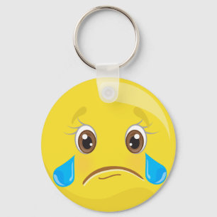 Triste com o chaveiro do Emoticon dos rasgos