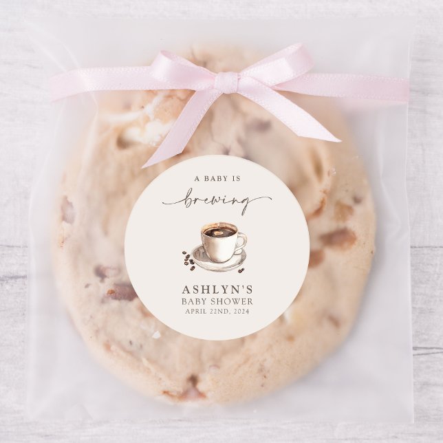 Um bebê está a criar um adesivo redondo de Chá de  (Criador carregado)