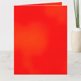 Um cartão com um design de gradiente vermelho e la