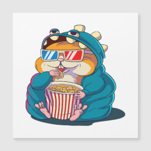 Um hamster engraçado usando óculos come pipoca