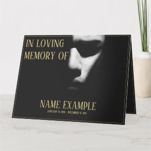 Um rosto adormecido em meio cartão sombra