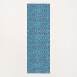Um tapete de yoga azul com um padrão geométrico su