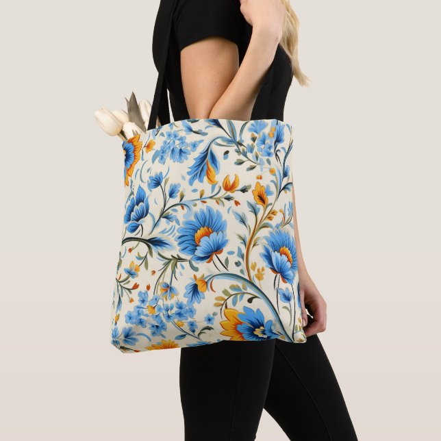 Uma bolsa de mão com alças pretas apresentando um  (Close Up)