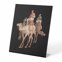 Uma caravana de camelos árabes viajando à noite