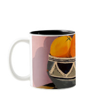 Uma linda caneca com design de pintura de laranjas