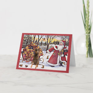 Ursos de Papais noeis de cartões de Natal Doberman