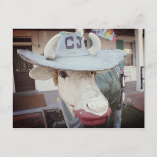 Vaca no batom em um cartão