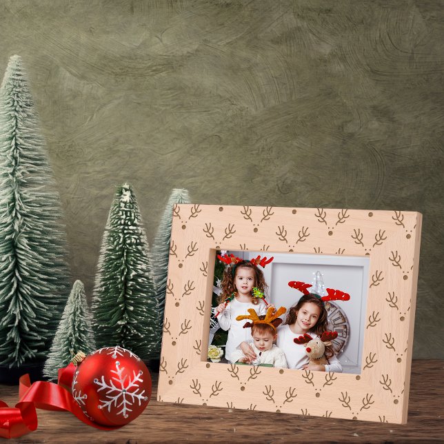 Whimsical Reindeer Pattern (A beautiful wood etched frame for displaying cherished holiday memories.)