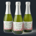 Winter Berries and Greens Christmas Cheers Mini<br><div class="desc">As bagas de inverno, as folhas e os lençóis freáticos de neve, por aquarelas, acentuam estas minisetiquetas de garrafas de vinho espumante. Personalize com seu nome e outros detalhes em letras quentes em QUAISQUER fontes COLOR para qualquer ocasião e perfeito para favores de Natal ou feriados, presentes de negócios, até...</div>