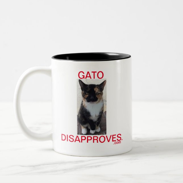 Xícara de dois tons, Gato desaprova (Esquerda)
