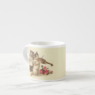 Xícara De Espresso Os gatinhos adoráveis cantam e jogam o violino