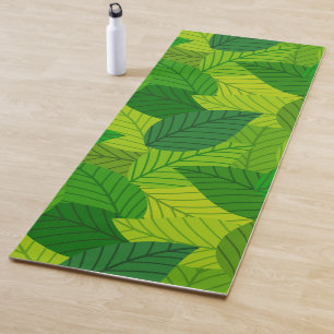Yoga O verde deixa um tapete de ioga.